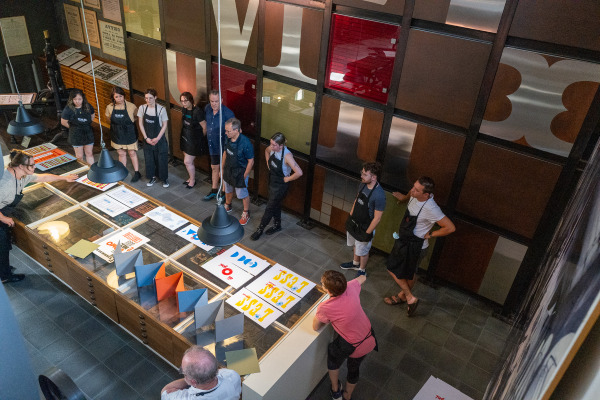 Residents reviewing work at Tipoteca Italiana.