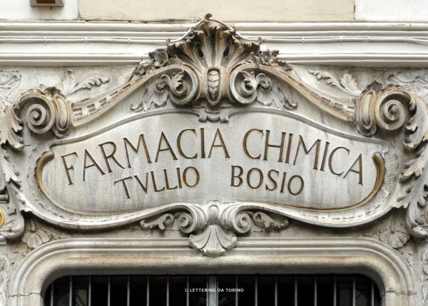 Classic lettering on an old building in Torino. Photo from Lettering da Torino.
