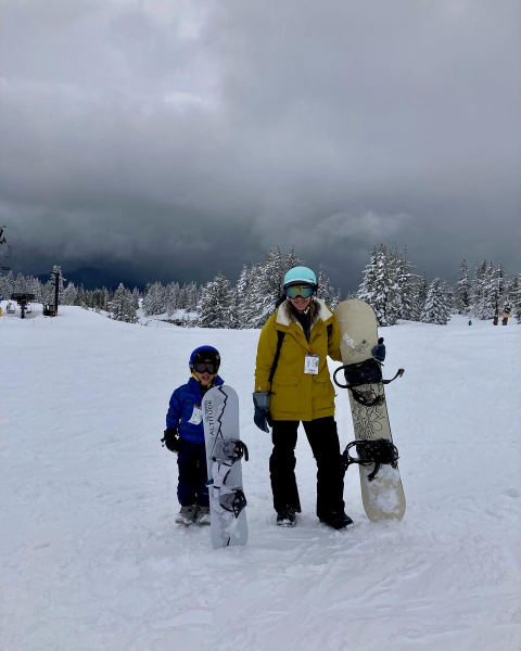 Kristin Ratzlaff snowboarding with her son
