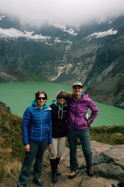 Kristin Ratzlaff at Laguna Amarilla. Mountains and water are in the background.