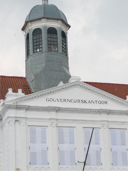 The Old Dutch Colonial Governor's Office in Kota Tua, Jakarta features vintage lettering on the sign.