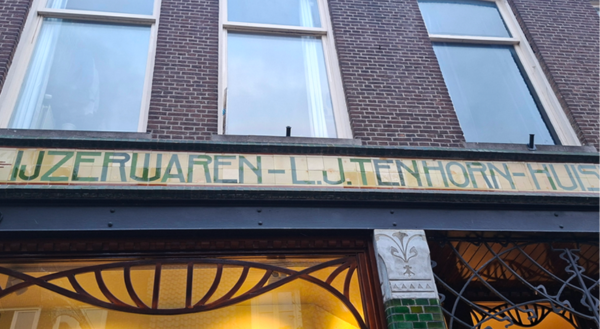 Art deco lettering on an old building.
