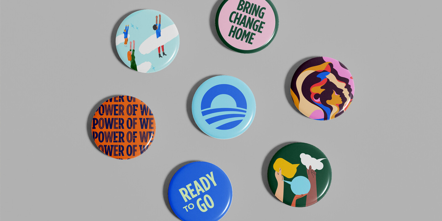 Obama Foundation pin badges with slogans like 