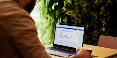 Man using Microsoft Word on Laptop Man using Microsoft Word on Laptop