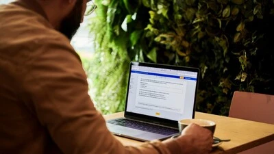 Man using Microsoft Word on Laptop Man using Microsoft Word on Laptop