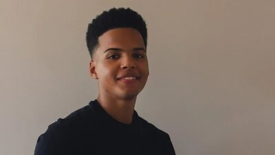 Headshot photo of Patrick Guanaz.