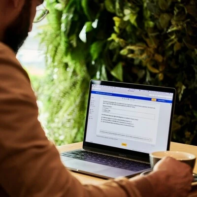 Man using Microsoft Word on Laptop Man using Microsoft Word on Laptop