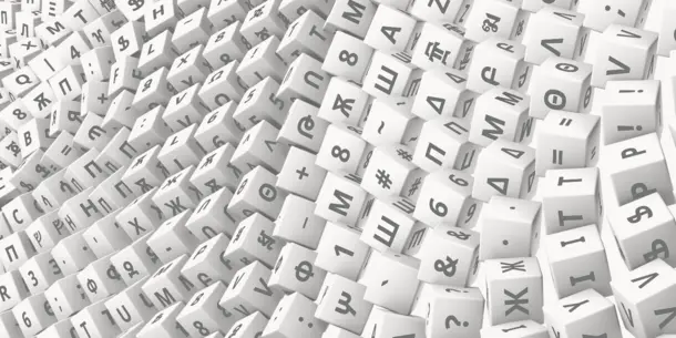 A rolling cascade of cubes, with various glyphs from different languages, as well as punctuation, on each side A rolling cascade of cubes, with various glyphs from different languages, as well as punctuation, on each side