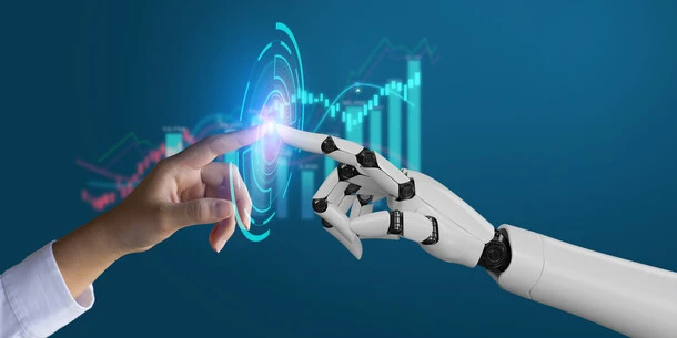 Image of human hand and robot hand touching fingers with charts and ripples and a blue background. Image credit: David Gyung/iStock Image of human hand and robot hand touching fingers with charts and ripples and a blue background. Image credit: David Gyung/iStock
