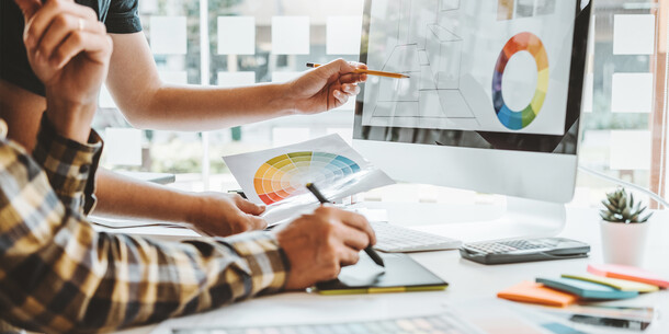 Professional businesswoman analyzing data charts on digital tablet in modern office setting. Professional businesswoman analyzing data charts on digital tablet in modern office setting.
