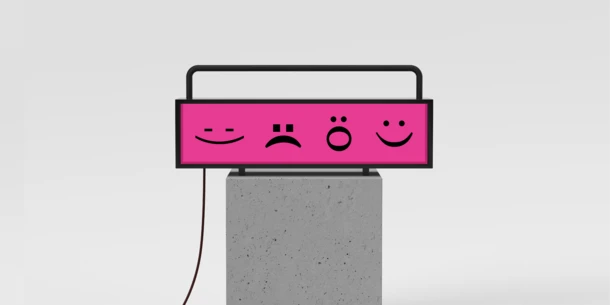 Image of a long pink screen with black emoji faces made with typography, showing a variety of expressions. Image of a long pink screen with black emoji faces made with typography, showing a variety of expressions.