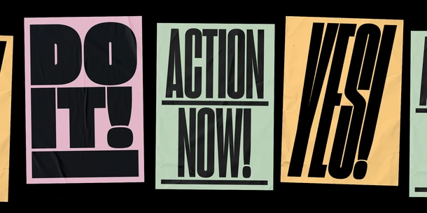 Five signs (three in frame) in pink, green, and yellow with the following text, respectively: "DO IT! ACTION NOW! YES!" Five signs (three in frame) in pink, green, and yellow with the following text, respectively: "DO IT! ACTION NOW! YES!"